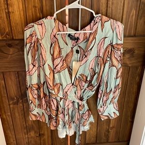 PatBo printed wrap top. Size small. New with tags.
